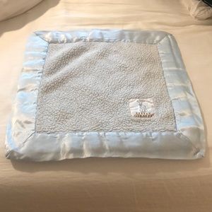 Little Giraffe brand small blanket.